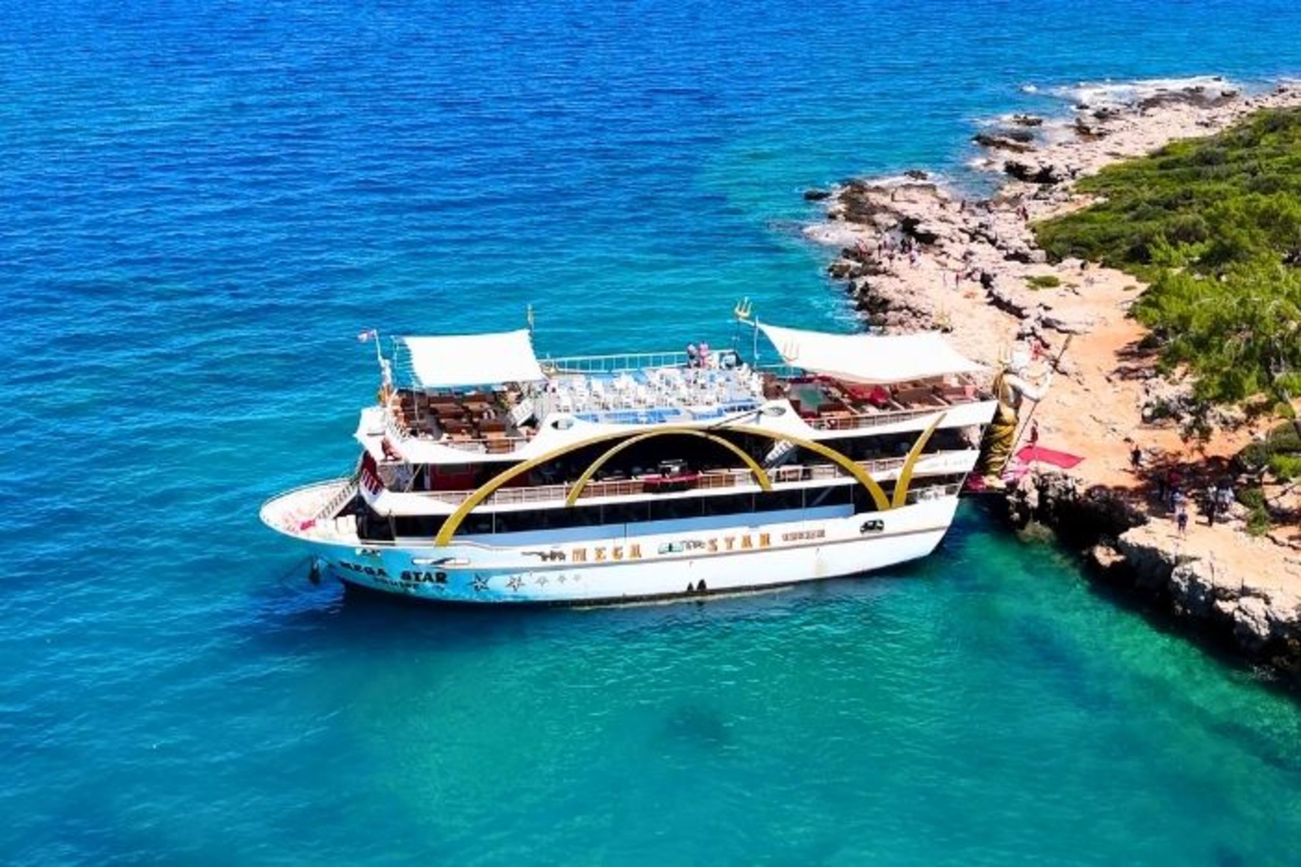 Antalya Mega Star boat tour with foam party swimming stops and Poseidon statue