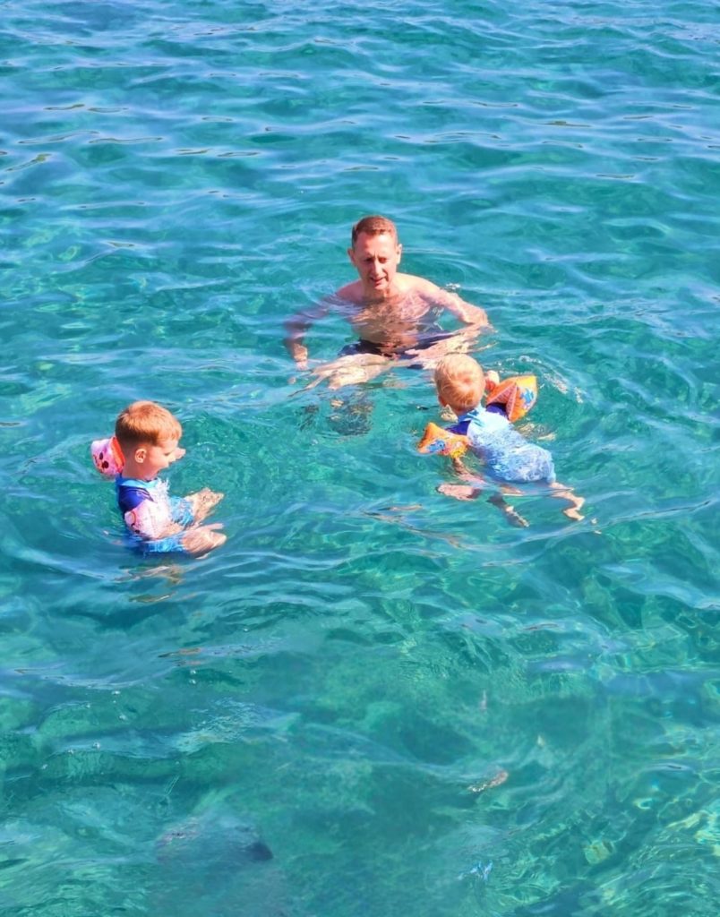 Swimming break in crystal clear turquoise water during Mega Star boat trip Kemer