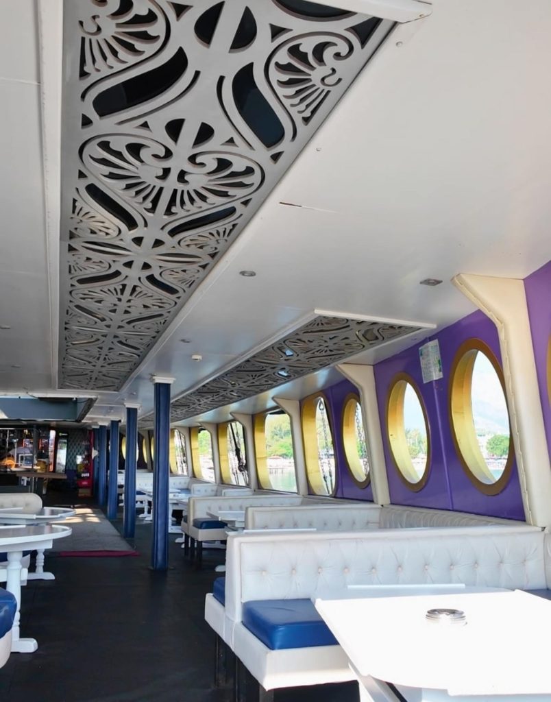 Belek pirate boat trip decorated interior seating area porthole windows ornate ceiling