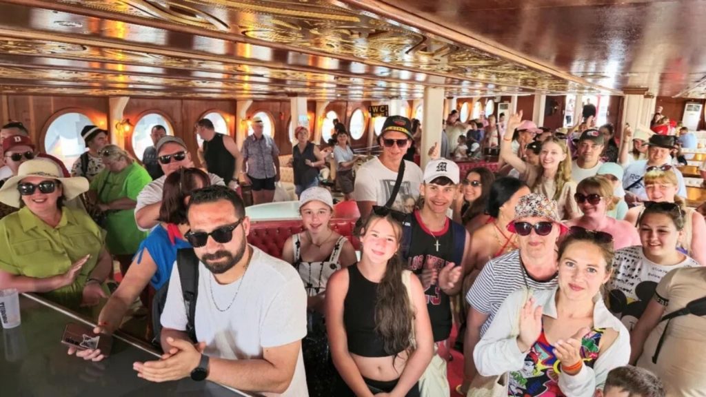 Belek pirate boat trip lively atmosphere inside decorated pirate ship guests enjoying