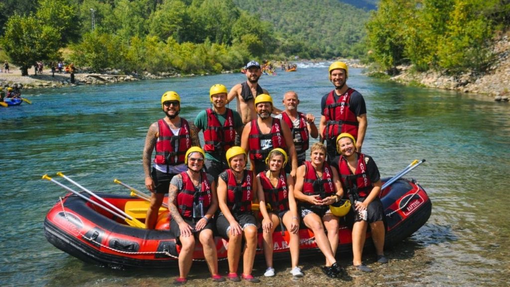 belek rafting group with life vests and helmets on a raft by the koprucay river