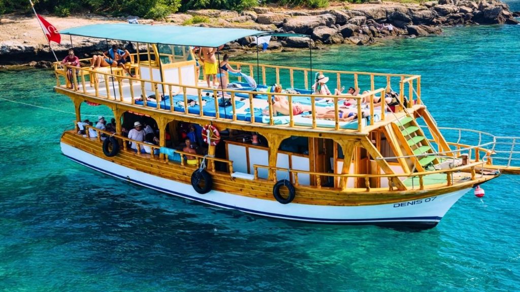 Wooden diving boat with sundeck on turquoise Mediterranean Sea on Alanya diving tour