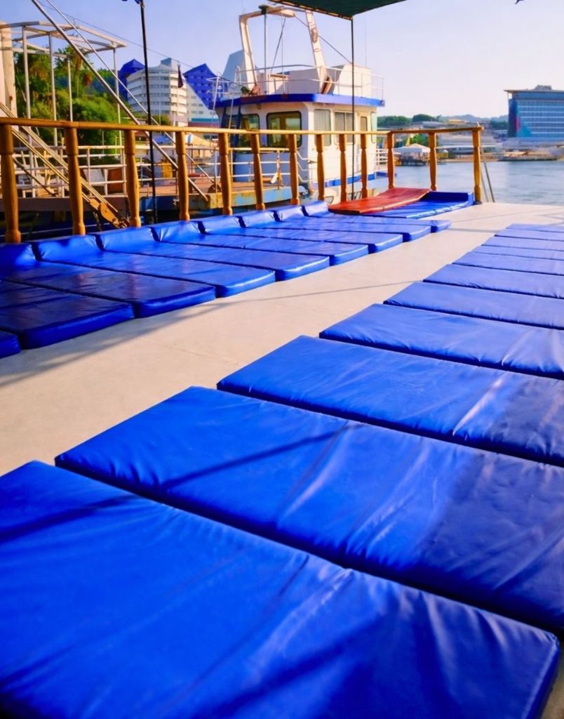 Blue sun beds on the sundeck of the Alanya diving tour boat