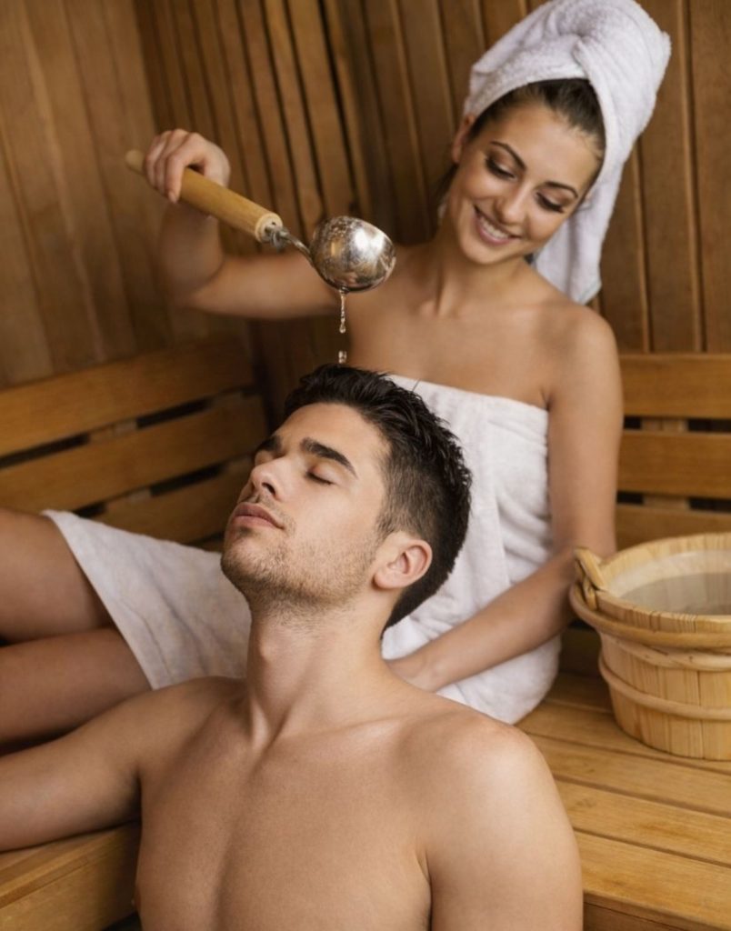 Relaxing sauna moment with traditional wooden water ladle at Alanya Turkish Bath