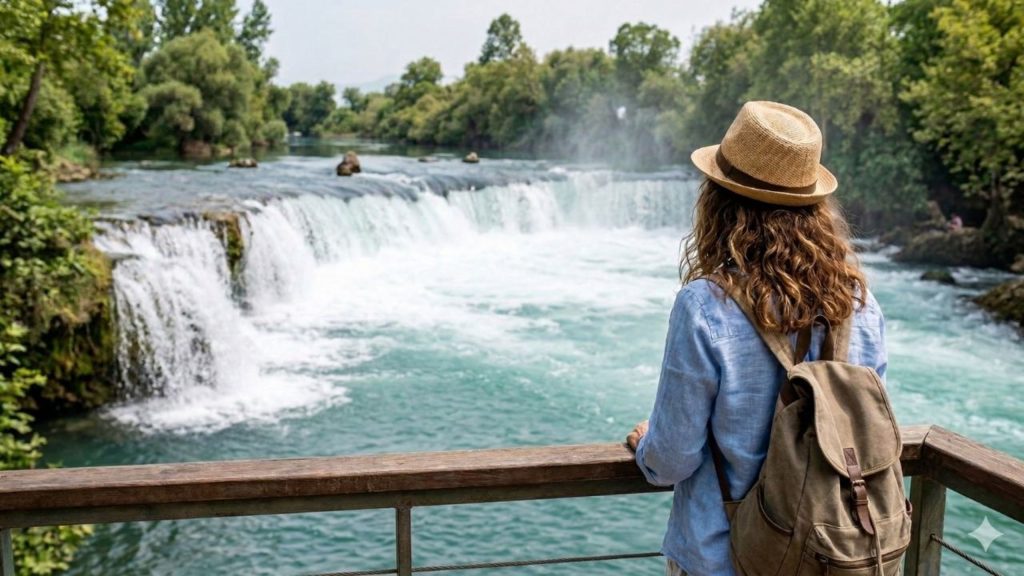 Manavgat Waterfall with turquoise water and lush green trees