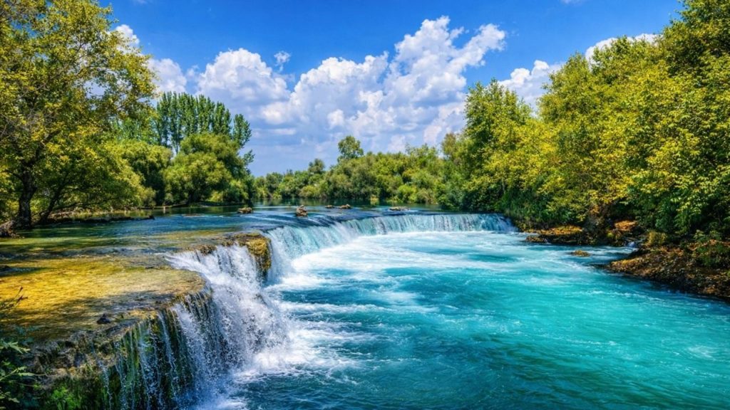 manavgat aspendos side tour manavgat waterfall wide turquoise cascade with green trees