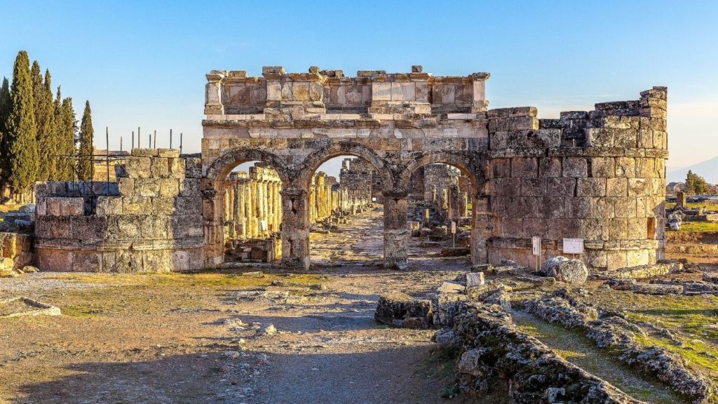 Hierapolis ancient city Roman gate with stone arches and columns Pamukkale