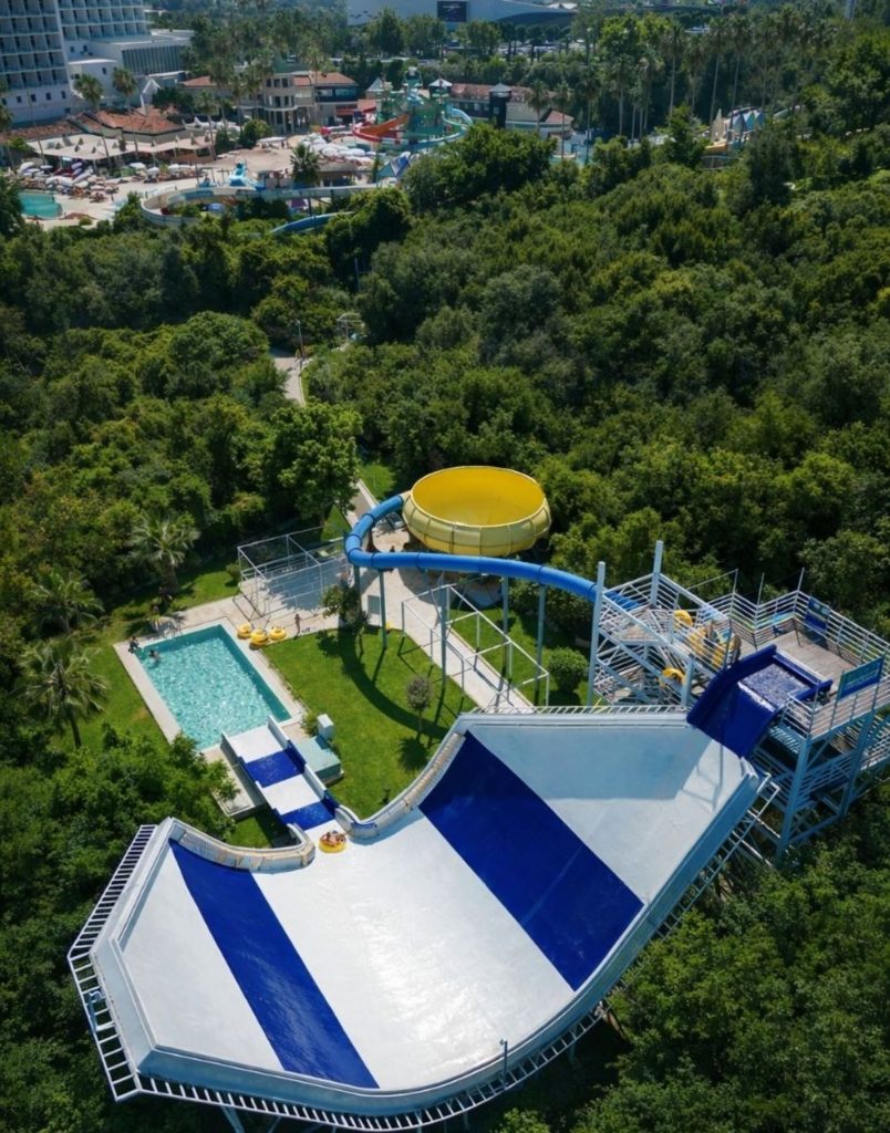 water hill aquapark aerial view of half pipe slide funnel ride and pool area