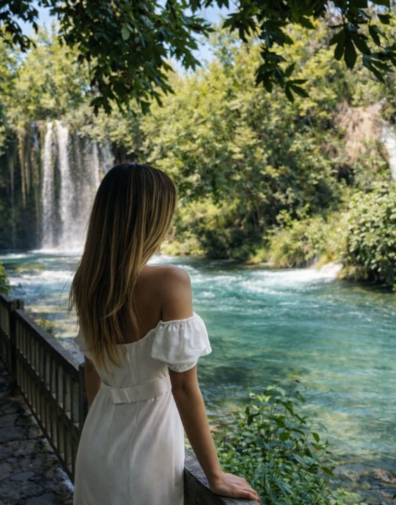 antalya city tour from side upper duden waterfall with lush green trees and turquoise pool