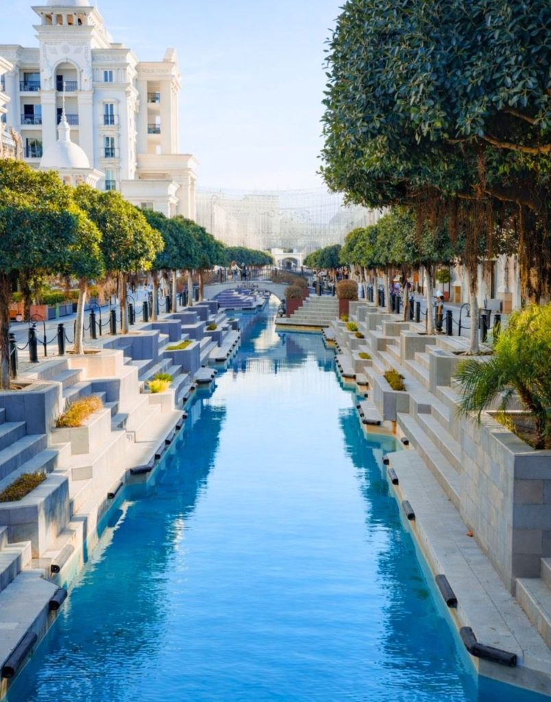 Land of Legends Belek water canal tree-lined boulevard luxury shopping avenue