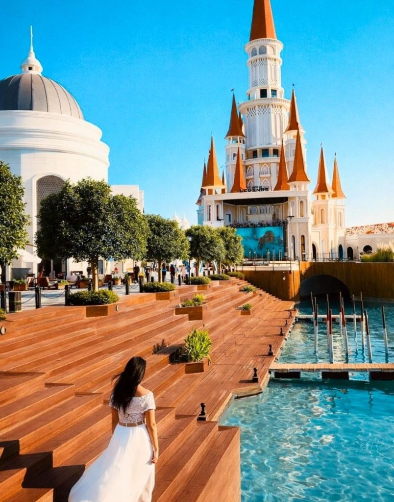 Majestic Land of Legends castle entrance with turquoise pools and fairytale towers in Antalya