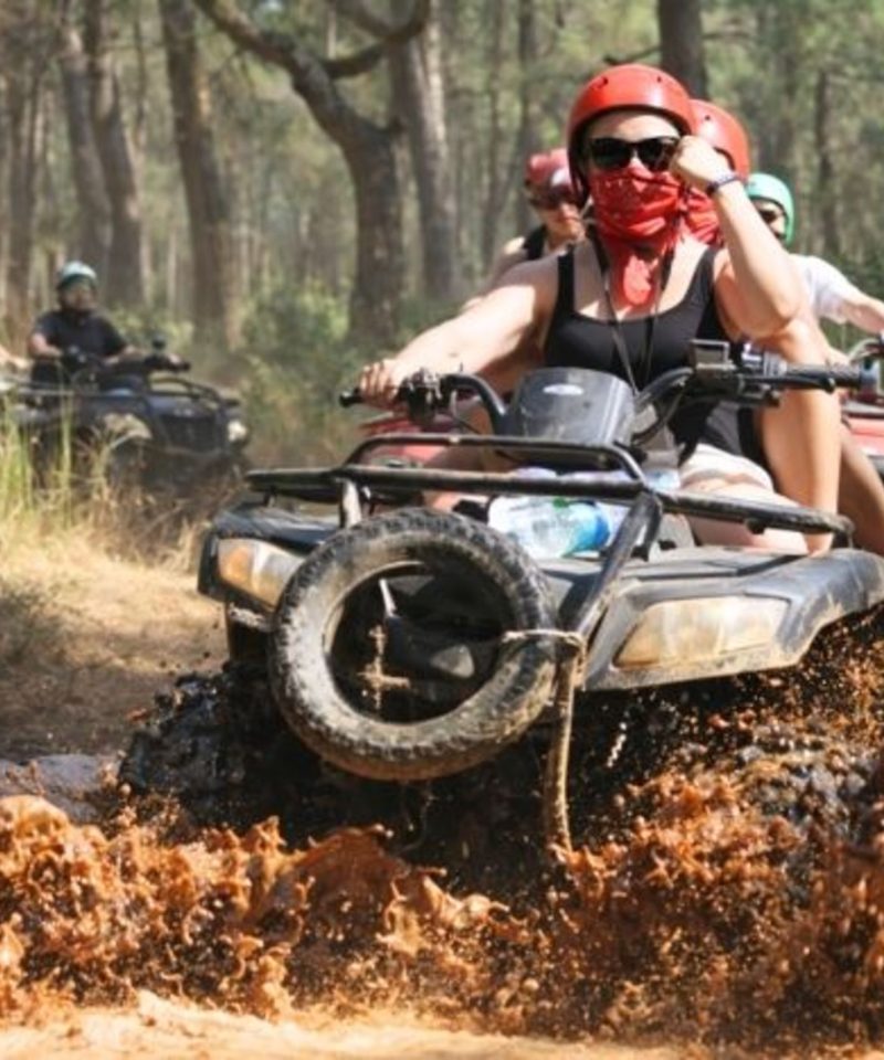Antalya quad biking safari tour through forest trails with river crossings and dusty off-road tracks