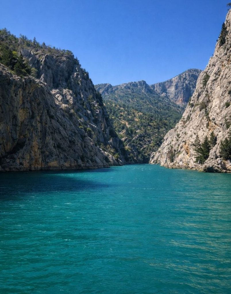 Narrow canyon passage with turquoise water at Green Canyon Oymapinar Taurus Mountains
