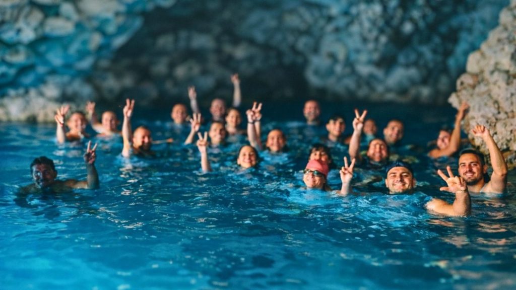 Swimming in blue sea cave near Suluada Island during boat trip from Antalya