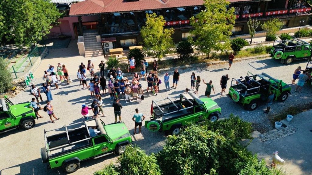 Jeep safari gathering point with open-top Land Rovers ready for Antalya adventure
