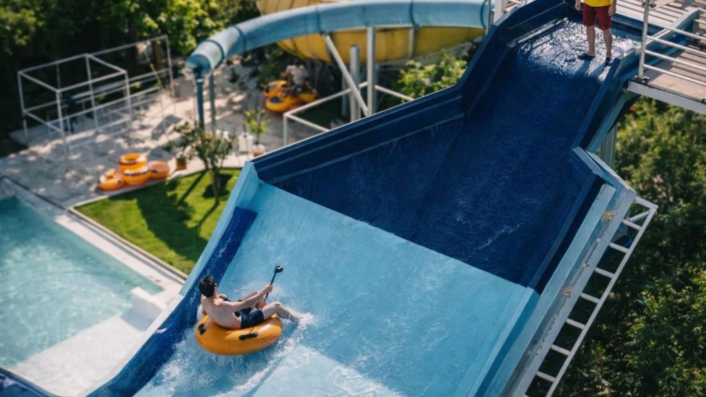 Thrilling water slide with tube at Water Hill Aquapark in Antalya