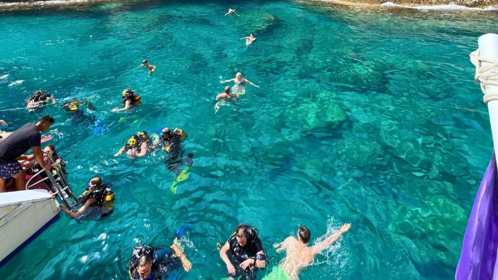 Belek scuba diving tour swimming break turquoise bay between dives refreshing