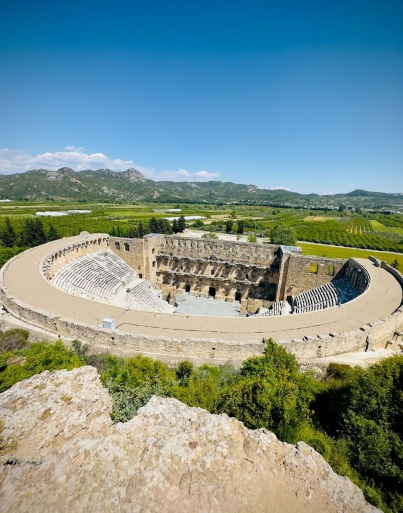 Panoramic view of Aspendos Theatre with Taurus Mountains in the background