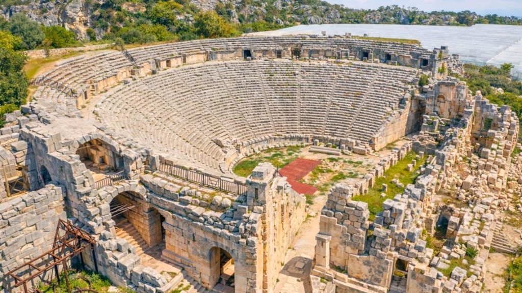 Aerial view of ancient Myra Theatre with stone seating rows Demre Turkey