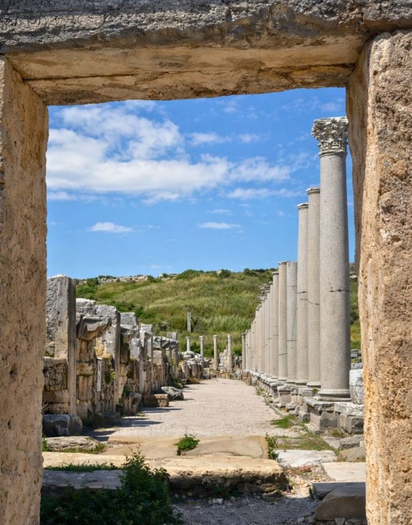 manavgat aspendos side tour perge ancient city colonnaded street seen through a stone gateway