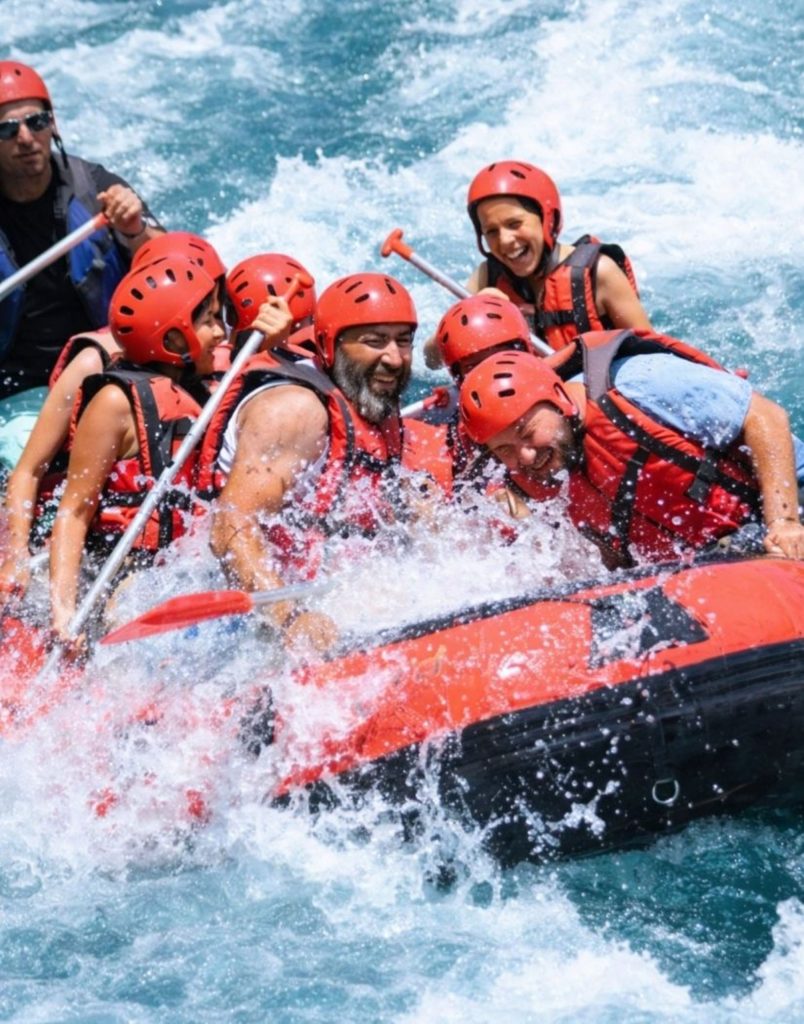 Antalya Koprulu Canyon family rafting in white water rapids laughing together on combo tour