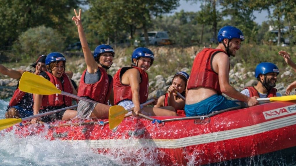 Antalya Koprulu Canyon rafting group celebrating on turquoise river on combo adventure tour