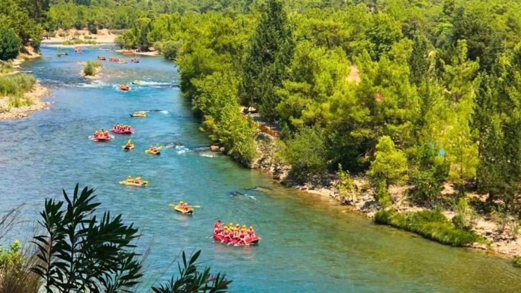 Aerial view of rafting boats on turquoise Koprulu Canyon river during Antalya Rafting and Zipline Tour
