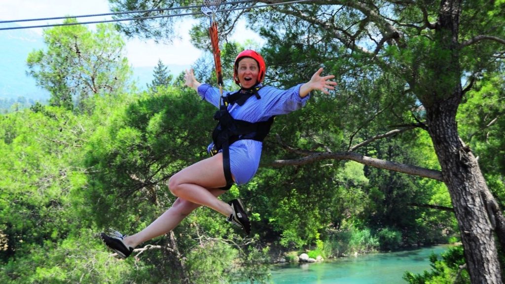 Zipline ride over green canyon during Antalya Rafting and Zipline Tour