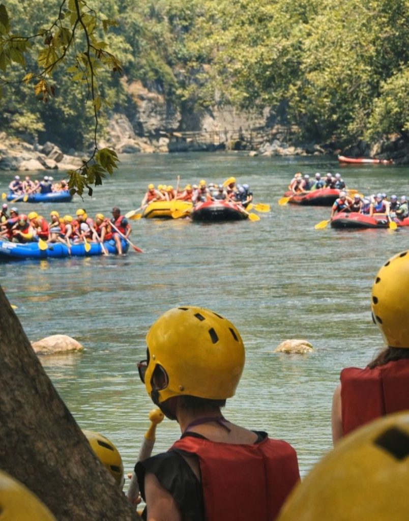 Colorful rafting boats on Koprulu Canyon river during Antalya Tazi Canyon Jeep Safari and Rafting Tour