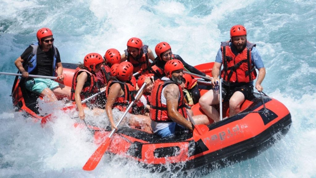 Group of tourists rafting through white water rapids at Koprulu Canyon in Antalya